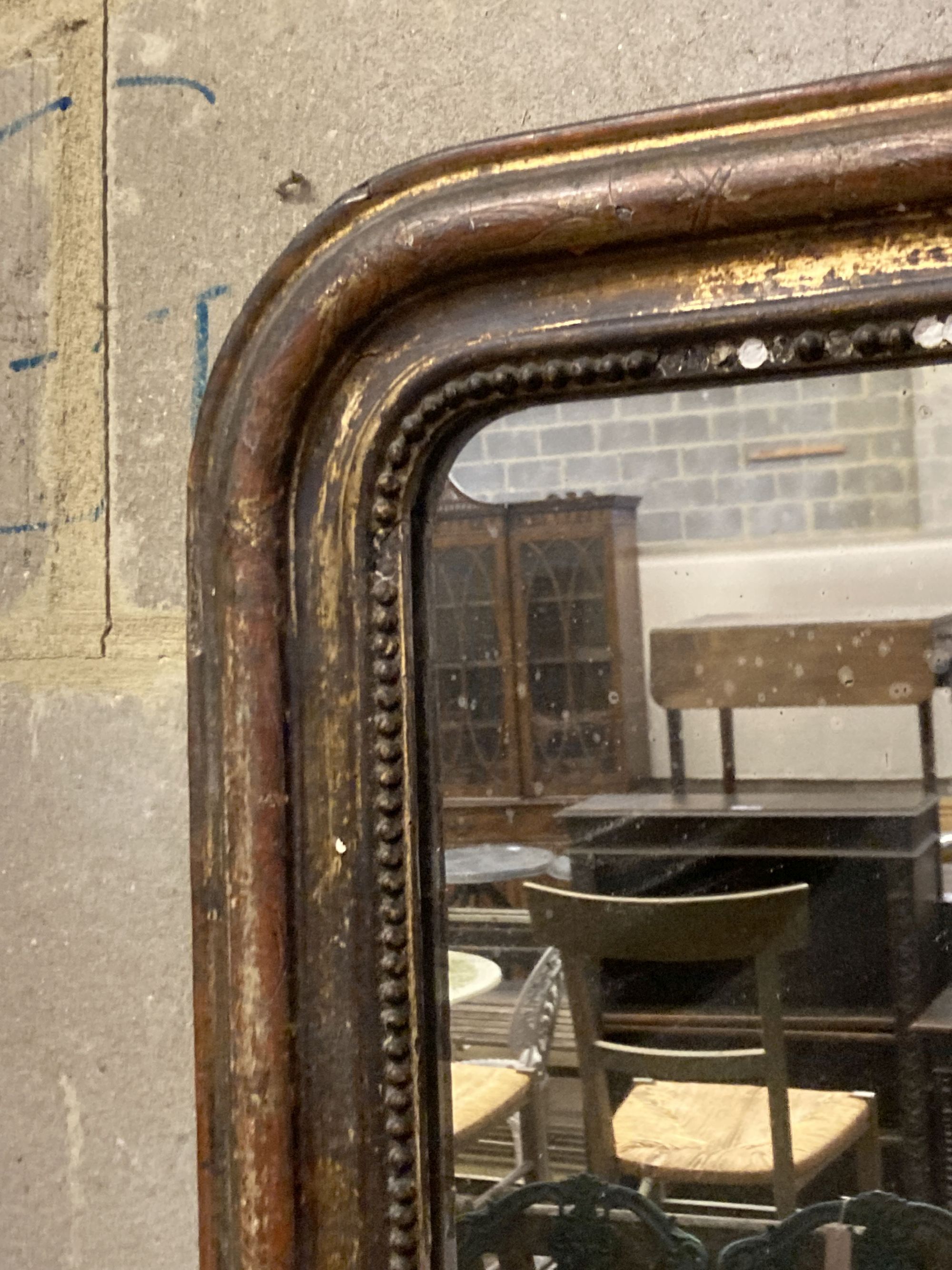 A 19th century French painted parcel gilt wall mirror, width 54cm, height 72cm